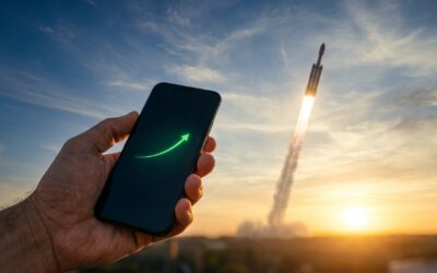 Hand hält ein Smartphone mit grünem Aufwärts-Chart, im Hintergrund startet eine Rakete im Sonnenaufgang